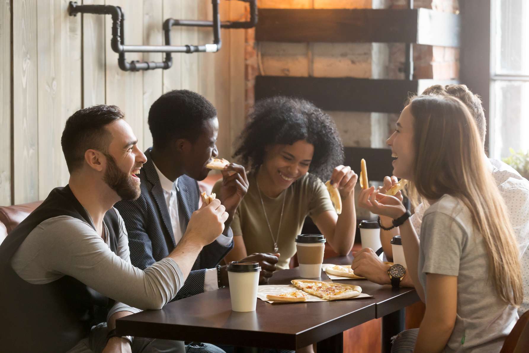 group of mix gendered students eating